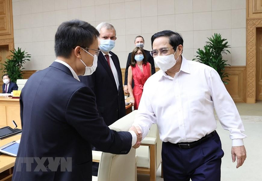 Thủ tướng Phạm Minh Chính với đại diện doanh nghiệp châu Âu tại Việt Nam. (Ảnh: Dương Giang/TTXVN)