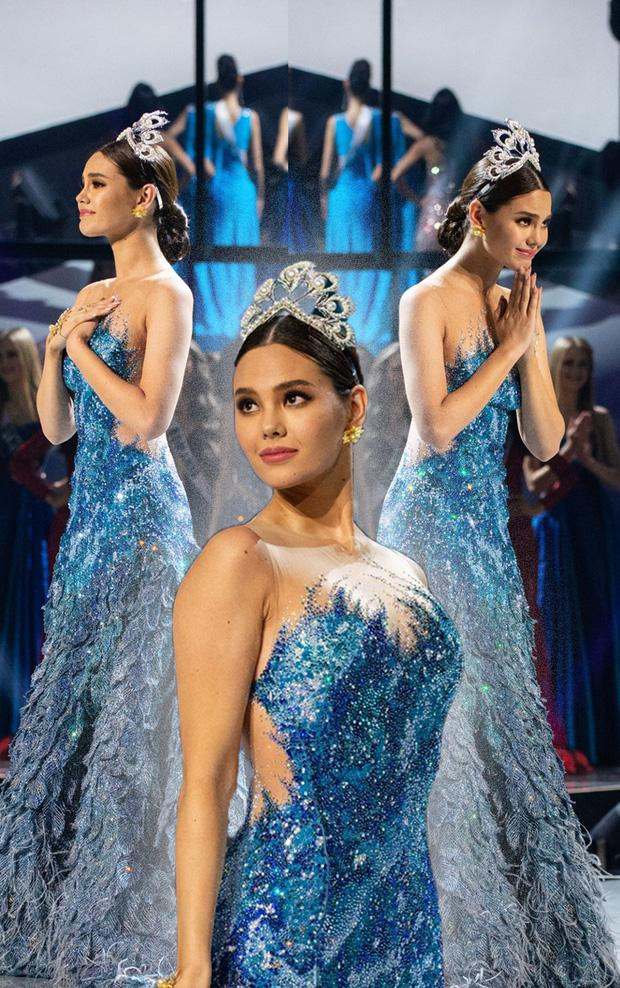 ...Khá tương đồng với bộ váy xanh Miss Philippines mặc cách đây 3 năm
