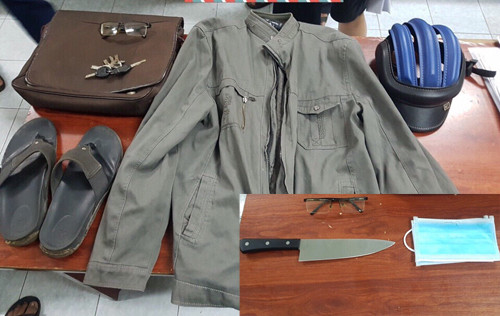 Tên cướp bịt mặt xông vào shop thời trang ở Sài Gòn ảnh 2