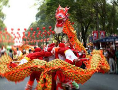 Múa rồng tại Ngày hội Văn hóa người Hoa mừng Năm mới tại tp.HCM.(Ảnh: Báo ảnh Việt Nam) Múa rồng tại Ngày hội Văn hóa người Hoa mừng Năm mới tại tp.HCM.(Ảnh: Báo ảnh Việt Nam)