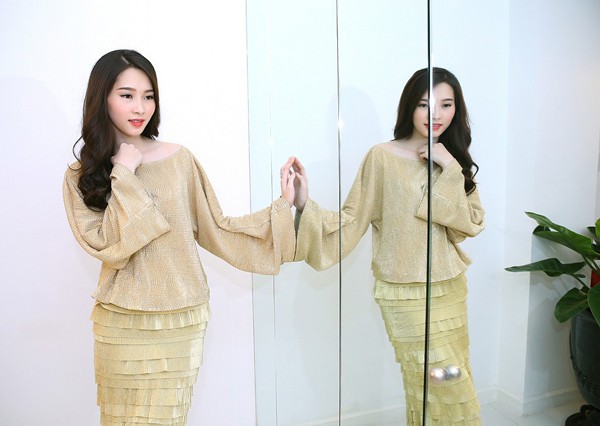 Hoa hậu Thu Thảo xinh đẹp hút hồn khi thử đồ ảnh 12