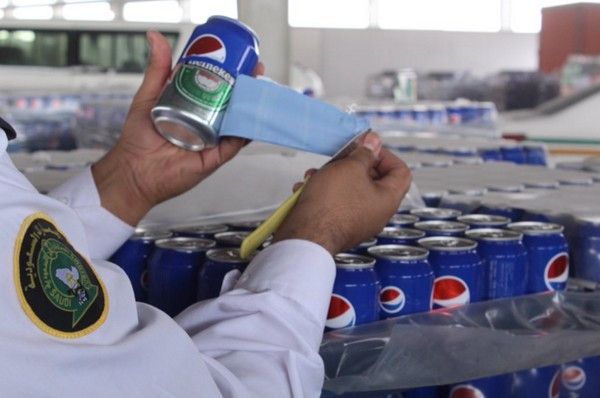 Bắt giữ 48.000 lon bia Heineken 'khoác áo' Pepsi để nhập lậu ảnh 2