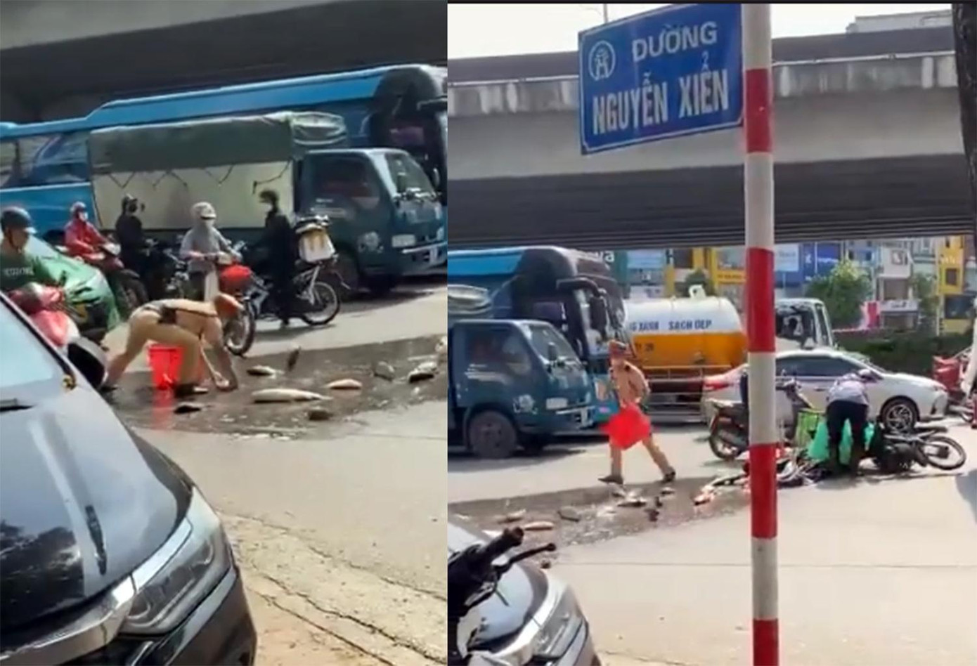 Hình ảnh CSGT cùng người dân hỗ trợ nhặt hơn 1 tạ cá đổ ra đường. Hình ảnh CSGT cùng người dân hỗ trợ nhặt hơn 1 tạ cá đổ ra đường.