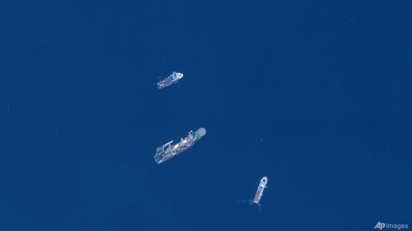 Ảnh vệ tinh cho thấy các tàu tìm kiếm ở khu vực tàu Titan mất tích. (Ảnh: AP) Ảnh vệ tinh cho thấy các tàu tìm kiếm ở khu vực tàu Titan mất tích. (Ảnh: AP)