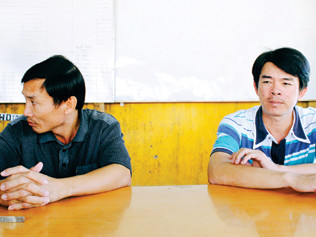 Đỗ Hoàng Em (trái) và Hà Văn Hoàng bị tạm giam. Ảnh: T.T.P (Thanh Niên)