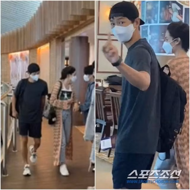 Bức ảnh được Sports Chosun chụp được từ những ngày đầu hẹn hò của cặp đôi, Song Joong Ki cố gắng bảo vệ bạn gái trước ống kính phóng viên.