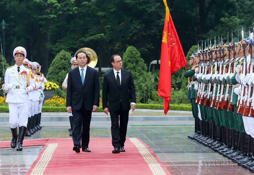 Chủ tịch nước Trần Đại Quang chủ trì lễ đón Tổng thống Pháp Francois Hollande thăm chính thức Việt Nam từ ngày 5-7/9/2016. (Ảnh: Nhan Sáng/TTXVN) Chủ tịch nước Trần Đại Quang chủ trì lễ đón Tổng thống Pháp Francois Hollande thăm chính thức Việt Nam từ ngày 5-7/9/2016. (Ảnh: Nhan Sáng/TTXVN)