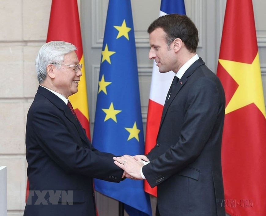 Tổng thống Emmanuel Macron đón và hội đàm với Tổng Bí thư Nguyễn Phú Trọng thăm chính thức Cộng hòa Pháp (Paris, 27/3/2018). (Ảnh: Trí Dũng/TTXVN) Tổng thống Emmanuel Macron đón và hội đàm với Tổng Bí thư Nguyễn Phú Trọng thăm chính thức Cộng hòa Pháp (Paris, 27/3/2018). (Ảnh: Trí Dũng/TTXVN)