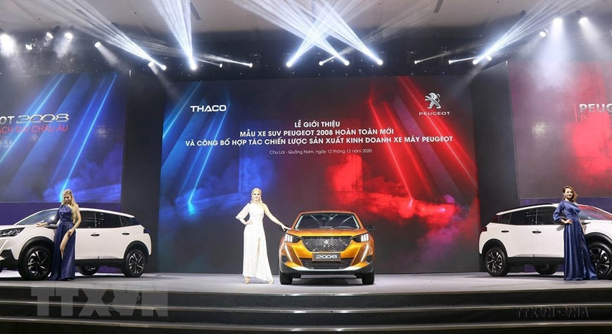 Ngày 12/12/2020, Công ty Cổ phần Ôtô Trường Hải (THACO) chính thức công bố hợp tác chiến lược sản xuất kinh doanh xe máy Peugeot và giới thiệu mẫu xe máy Peugeot Django. Đồng thời, giới thiệu mẫu xe SUV Peugeot 2008 hoàn toàn mới. Đây là sự kiện đánh dấu 210 năm thương hiệu Peugeot của Pháp và 100 năm tạo dấu ấn thương hiệu này tại Việt Nam. (Ảnh: Trần Tĩnh/TTXVN) Ngày 12/12/2020, Công ty Cổ phần Ôtô Trường Hải (THACO) chính thức công bố hợp tác chiến lược sản xuất kinh doanh xe máy Peugeot và giới thiệu mẫu xe máy Peugeot Django. Đồng thời, giới thiệu mẫu xe SUV Peugeot 2008 hoàn toàn mới. Đây là sự kiện đánh dấu 210 năm thương hiệu Peugeot của Pháp và 100 năm tạo dấu ấn thương hiệu này tại Việt Nam. (Ảnh: Trần Tĩnh/TTXVN)