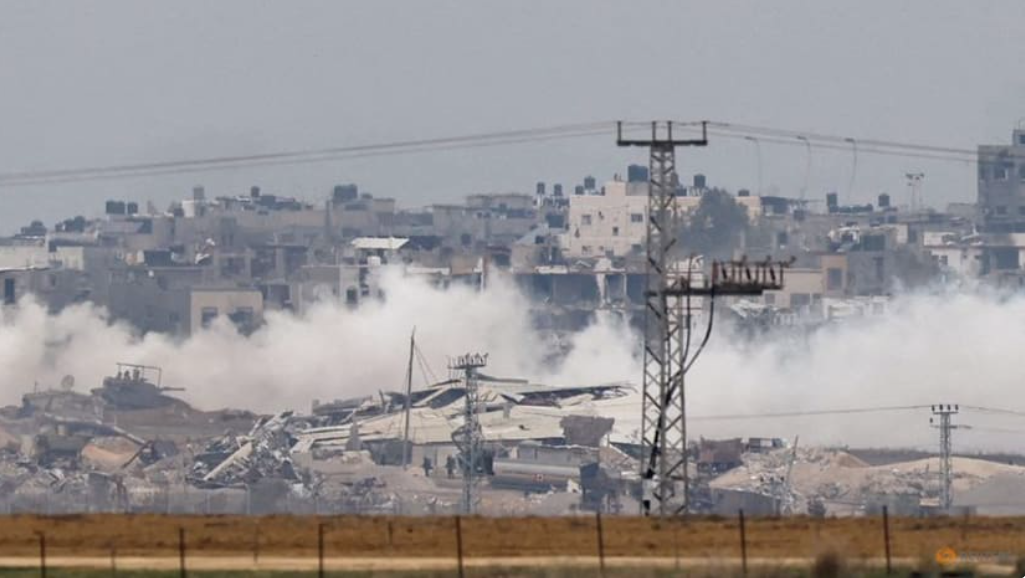 Xe tăng và binh lính Israel hoạt động ở Dải Gaza ngày 21/12. (Ảnh: Reuters)