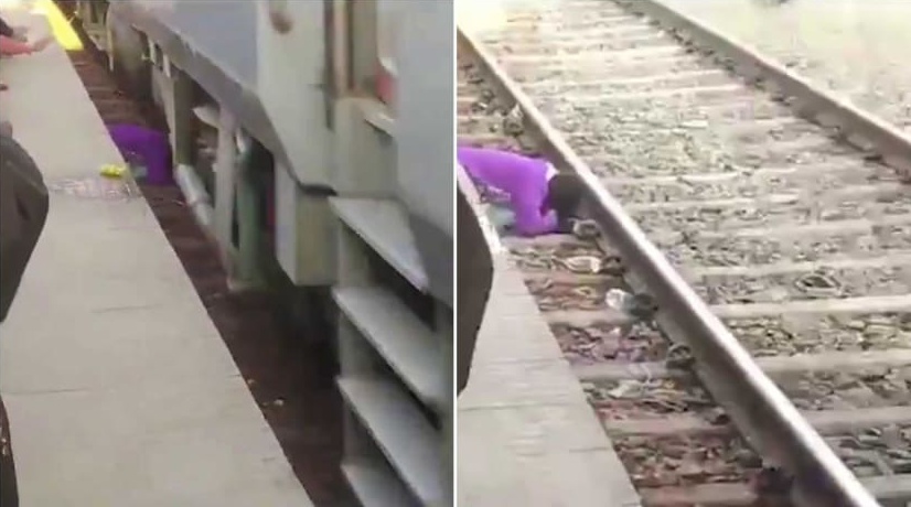 Hình ảnh đoàn tàu chạy qua người phụ nữ. Hình ảnh đoàn tàu chạy qua người phụ nữ.