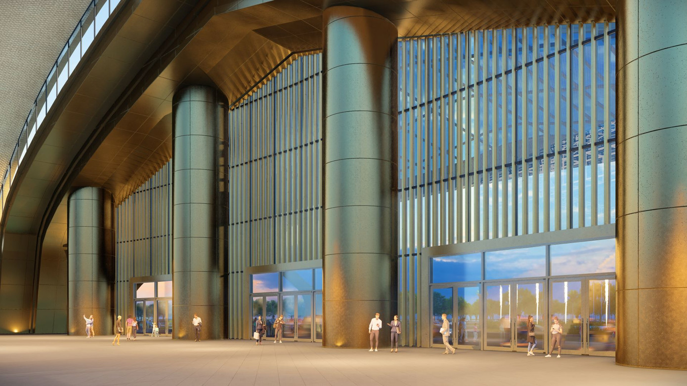 Nhìn từ phía trong gian triển lãm trung tâm, sảnh chính gây ấn tượng với hệ cột bề thế, được ốp kim loại mang đến vẻ đẹp sang trọng. Tường xung quanh nhà triển lãm là vách kính với hệ lan mau vừa tạo tính thẩm mỹ, vừa giúp cản nắng. Trong khi đó, phần “mai rùa” của Thần Kim Quy dùng vật liệu mái bạt nhẹ, có tính xuyên sáng. Thiết kế này đáp ứng đúng tiêu chuẩn kiến trúc xanh, tiết kiệm năng lượng của các công trình tầm vóc toàn cầu. Ngoài nhà triển lãm chính, tổ hợp còn bố trí các công trình có chức năng chuyên biệt, đảm bảo đáp ứng chuyên sâu các nhu cầu khác nhau, như Trung tâm Hội nghị và Tiệc cưới; Trung tâm triển lãm thường xuyên (khối A và B); Khu vực triển lãm ngoài trời rộng 20ha để tổ chức các sự kiện triển lãm có quy mô cực lớn, sản phẩm triển lãm siêu trường siêu trọng; 6 bãi đậu xe ngoài trời…