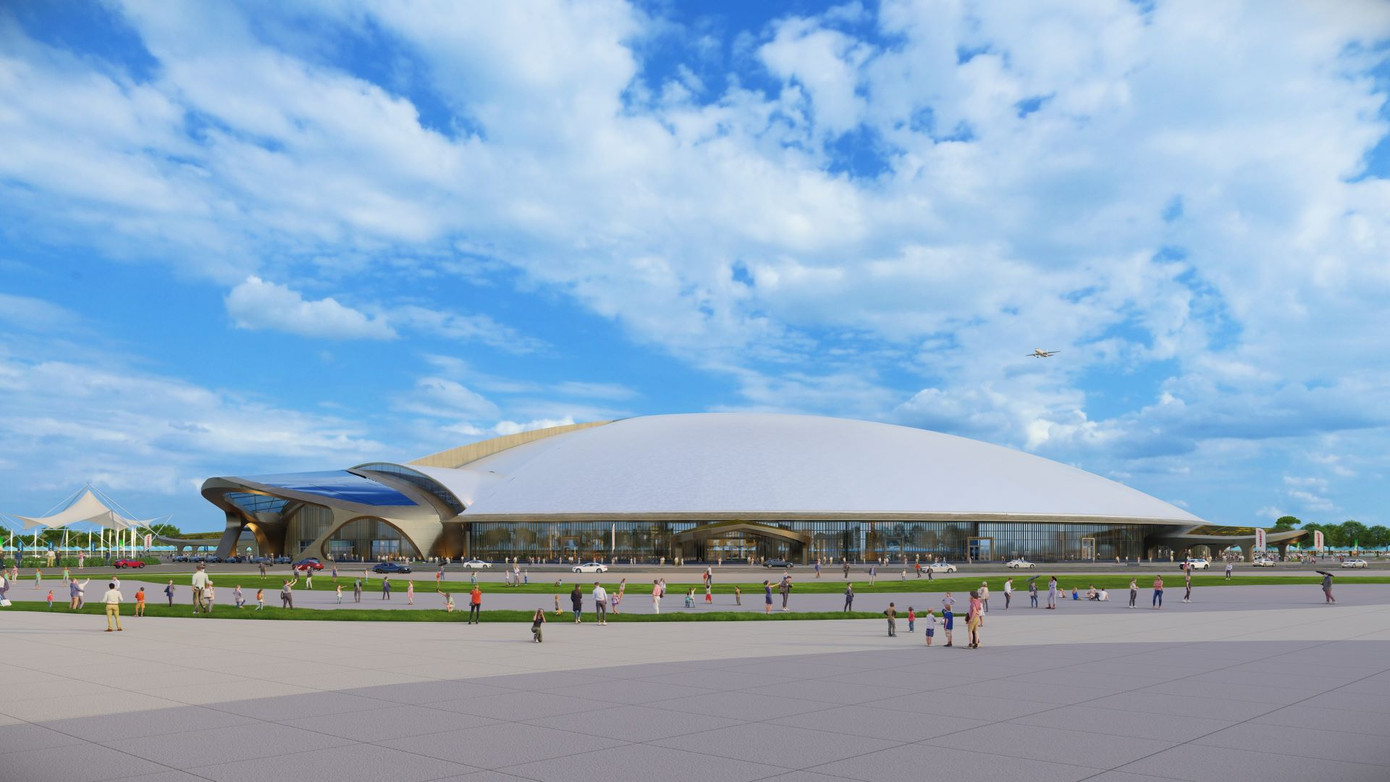 Mái sảnh chính của nhà triển lãm trong nhà tượng trưng cho đầu của Thần Kim Quy, trong khi 8 mái sảnh phụ tượng trưng cho chân Thần Kim Quy. Mái vòm công trình có chiều cao khoảng 56,26m tạo hình cho mai Thần Kim Quy. Đường kính ngoài của tòa nhà triển lãm khoảng 360m, đường kính của Gian triển lãm trung tâm khoảng 120m.