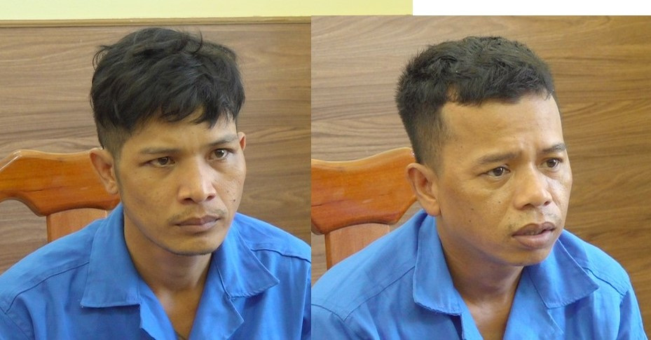 Thiện (trái) và Nhỏ tại cơ quan công an.