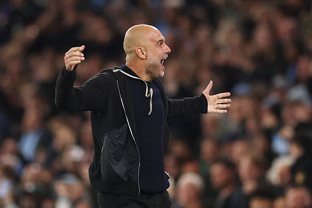 Niềm vui chiến thắng không thể xoa dịu sự thất vọng của HLV Guardiola. Ảnh: Getty Images.