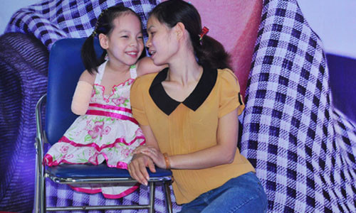 Nụ cười thường trực trên khuôn mặt đáng yêu của cô bé được ví 