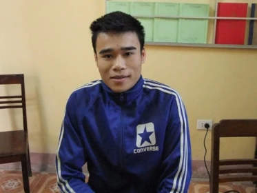 Phạm Văn Trung tại cơ quan công an