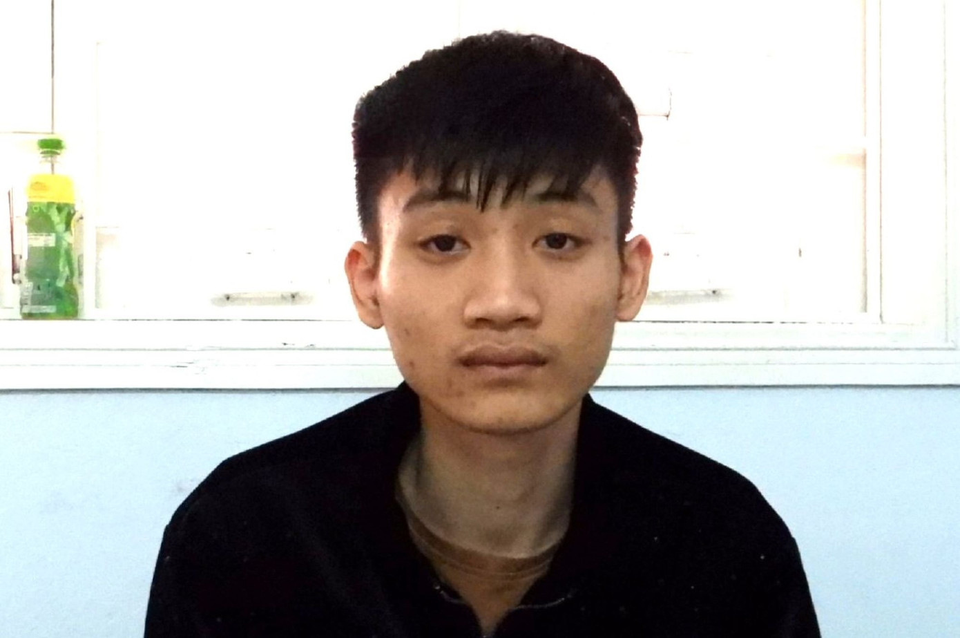 Đối tượng Nguyễn Hồng Nam tại cơ quan công an. Ảnh: H.C