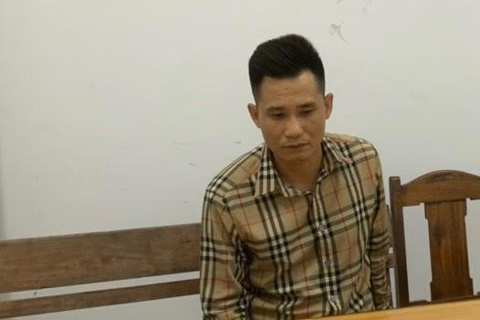 Đối tượng Phạm Văn Tiến tại cơ quan công an. Ảnh: CA cung cấp