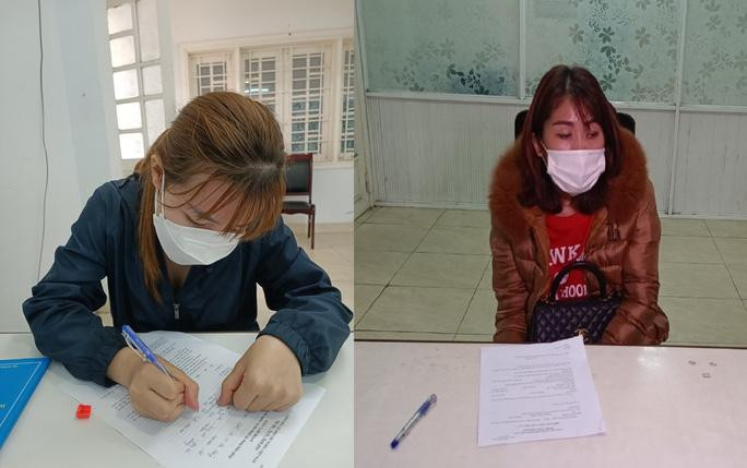 Nguyễn Thị Anh và Lê Thị Bình tại cơ quan công an.