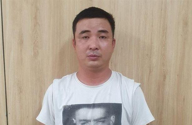 Đối tượng Văn Quý Đạt tại cơ quan công an. Ảnh: CAĐN