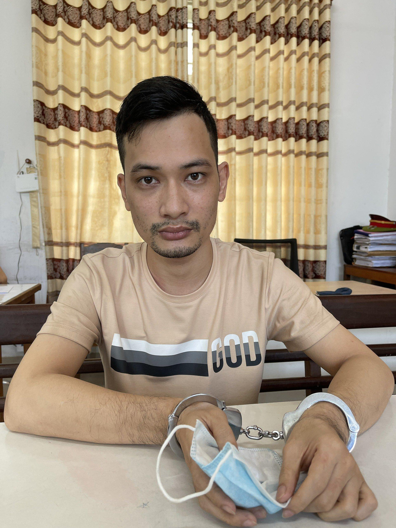 Đối tượng Tuấn tại cơ quan công an.