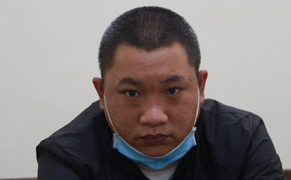 Đối tượng Ngô Hoàng Phúc tại cơ quan công an. Ảnh: V.N.N