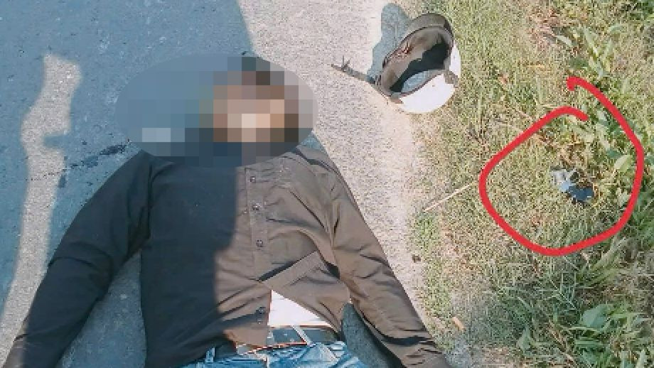 Đối tượng nghi phạm và khẩu súng tại hiện trường.