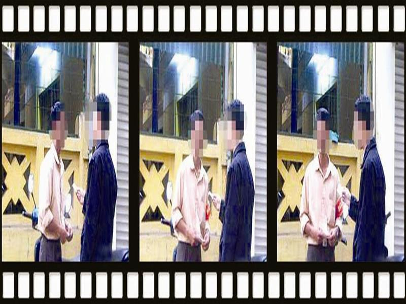 Cảnh đưa giấy hẹn, nhận CMND, lúc 17h ngày 29/3 (trích băng ghi hình)