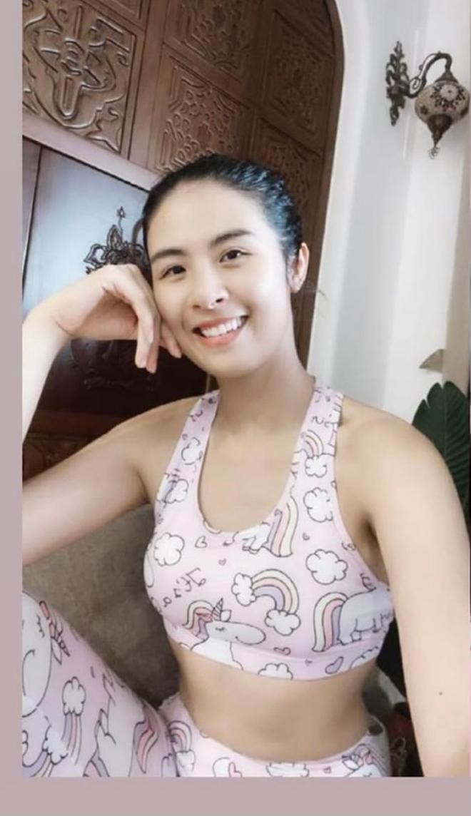 Hoa hậu Ngọc Hân mặc crop-top khoe vòng eo thon gọn quyến rũ khi ở nhà tập thể dục.