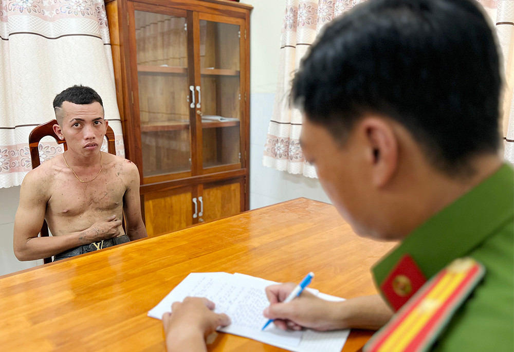 Lê Văn Tài tại cơ quan công an. Ảnh: PV.