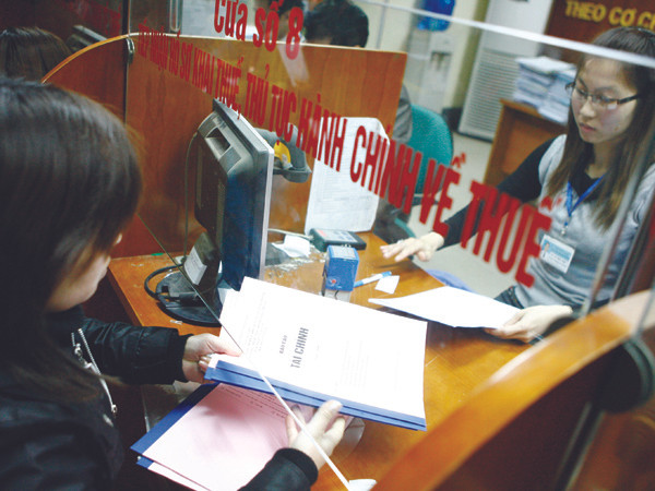 Sẽ thay đổi mức giảm trừ gia cảnh cho người nộp thuế TNCN Ảnh: Hồng Vĩnh. Sẽ thay đổi mức giảm trừ gia cảnh cho người nộp thuế TNCN Ảnh: Hồng Vĩnh