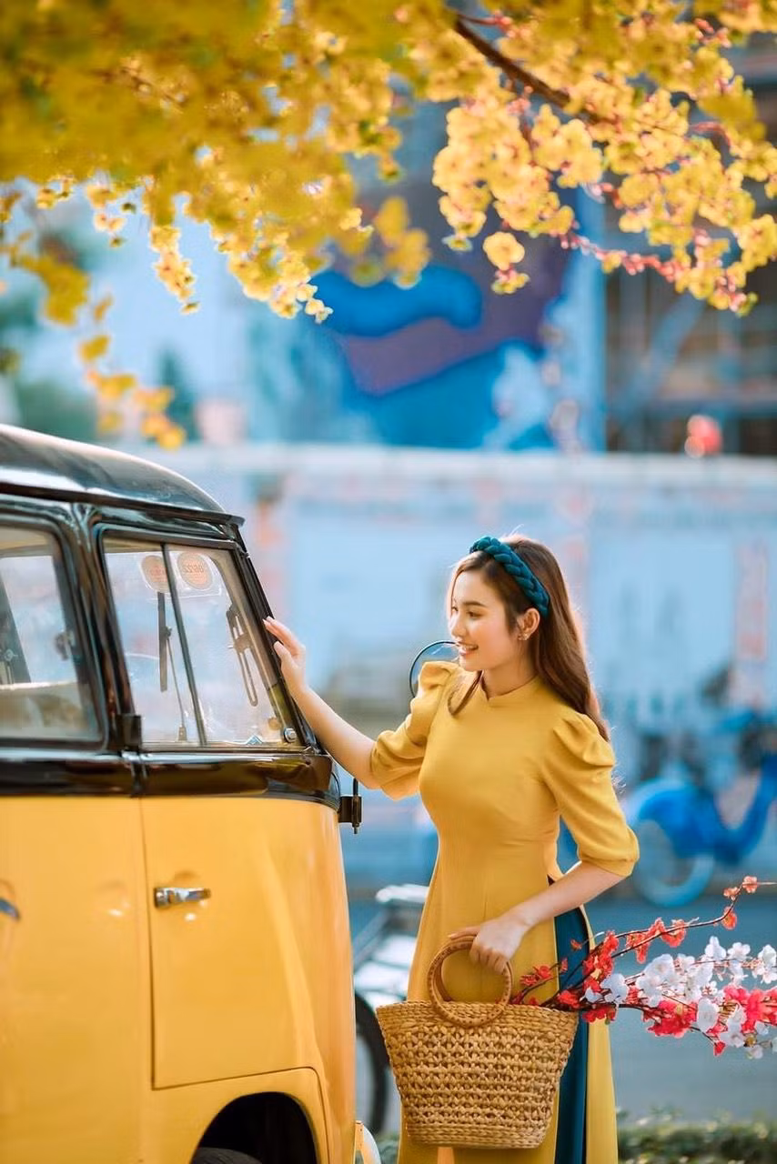 Cô gái Bến Tre luôn nở nụ cười để có những tấm hình chào Xuân đẹp nhất.