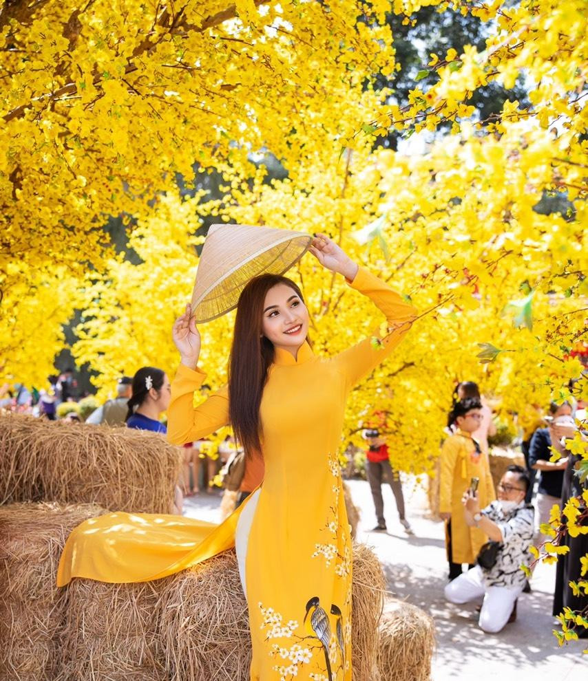 Cô gái Bến Tre luôn nở nụ cười để có những tấm hình chào Xuân đẹp nhất.