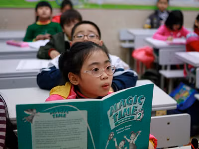Giờ học tiếng Anh của học sinh tiểu học Tây Sơn, Hà Nội Ảnh: Hồng Vĩnh