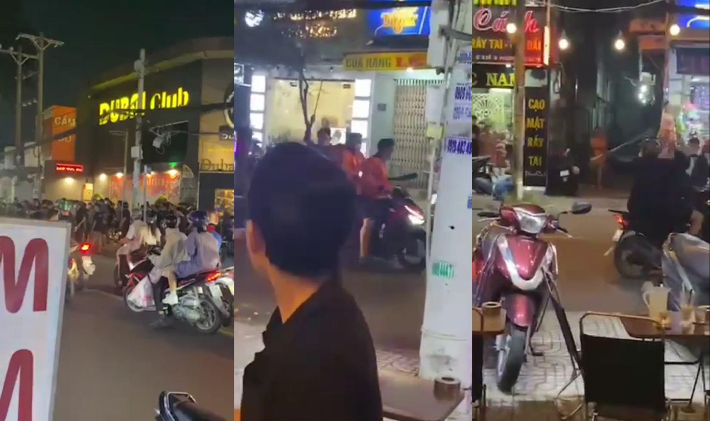Nhóm người cầm hung khí rượt đuổi, chửi bới gây náo loạn trên đường. (Ảnh chụp từ clip)