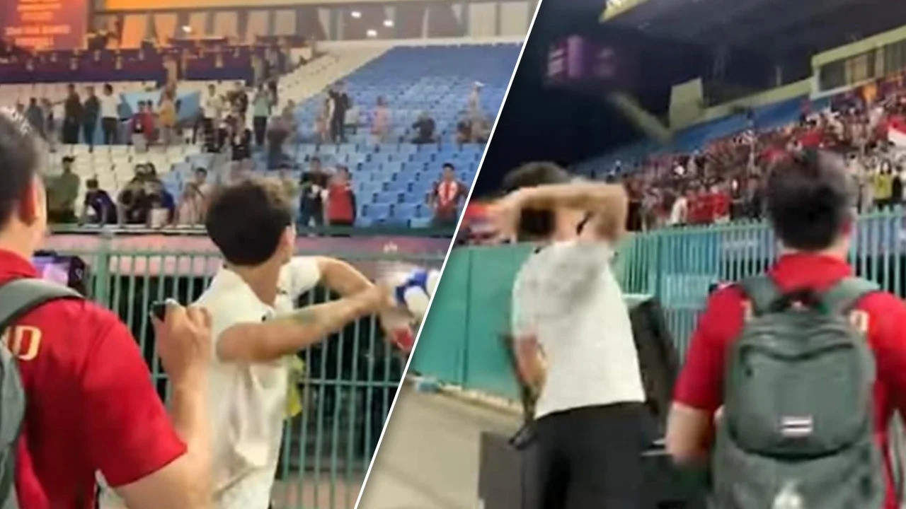 Khemdee ném huy chương và quà lưu niệm của BTC lên khán đài Khemdee ném huy chương và quà lưu niệm của BTC lên khán đài