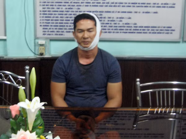 Trí và Nga tại cơ quan điều tra