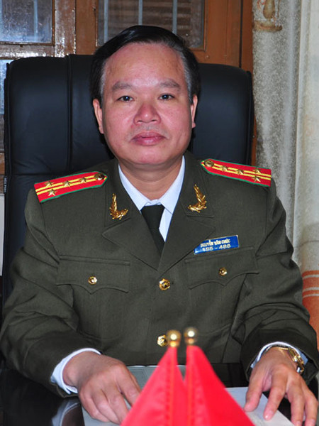 Đại tá Nguyễn Văn Chức trao đổi với phóng viên chiều 11-12