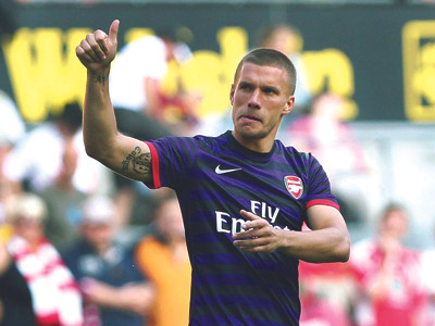 Chân sút Podolski là niềm hy vọng mới của Arsenal thời hậu Van Persie. Ảnh: Getty Images
