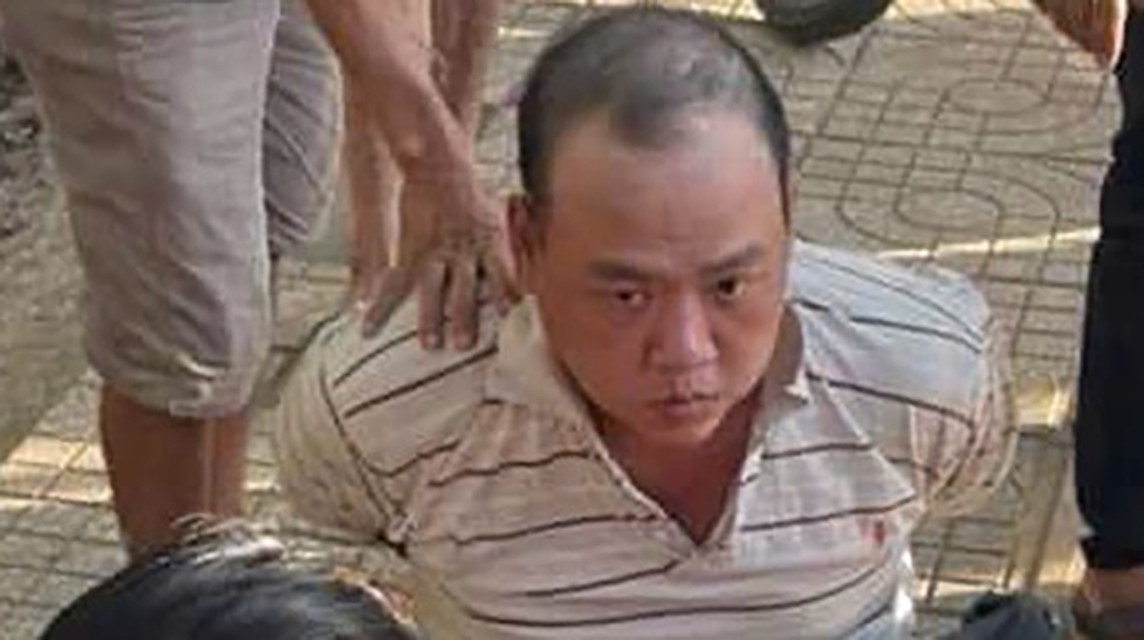 Đối tượng Bùi Chí Bình lúc bị bắt.