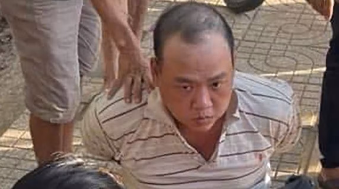 Đối tượng Bùi Chí Bình lúc bị bắt.