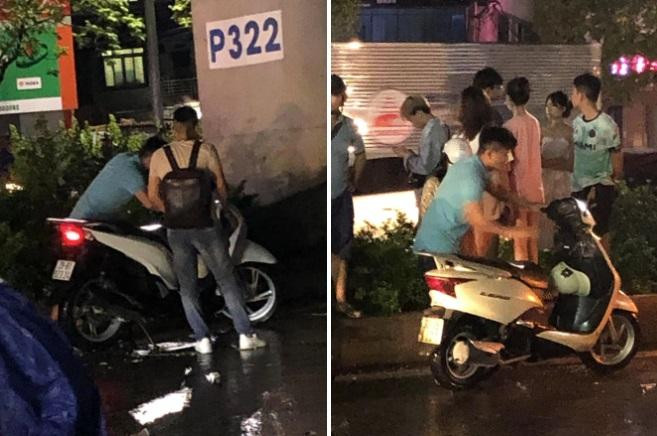 Thành Quân giúp khởi động nhiều xe chết máy do mưa lớn. Ảnh: Thảo Clover. Thành Quân giúp khởi động nhiều xe chết máy do mưa lớn. Ảnh: Thảo Clover.