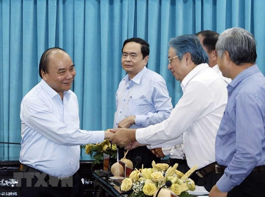 Chủ tịch nước Nguyễn Xuân Phúc làm việc với Ban Thường vụ Tỉnh ủy Bến Tre. (Ảnh: Thống Nhất/TTXVN)