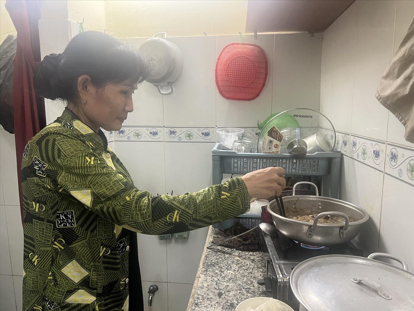 Bà Lưu Mỹ Trang làm việc tại Cty PouYuen gần 16 năm, trong lần cắt giảm này bà nhận được hơn 200 triệu đồng tiền hỗ trợ ảnh: U.P