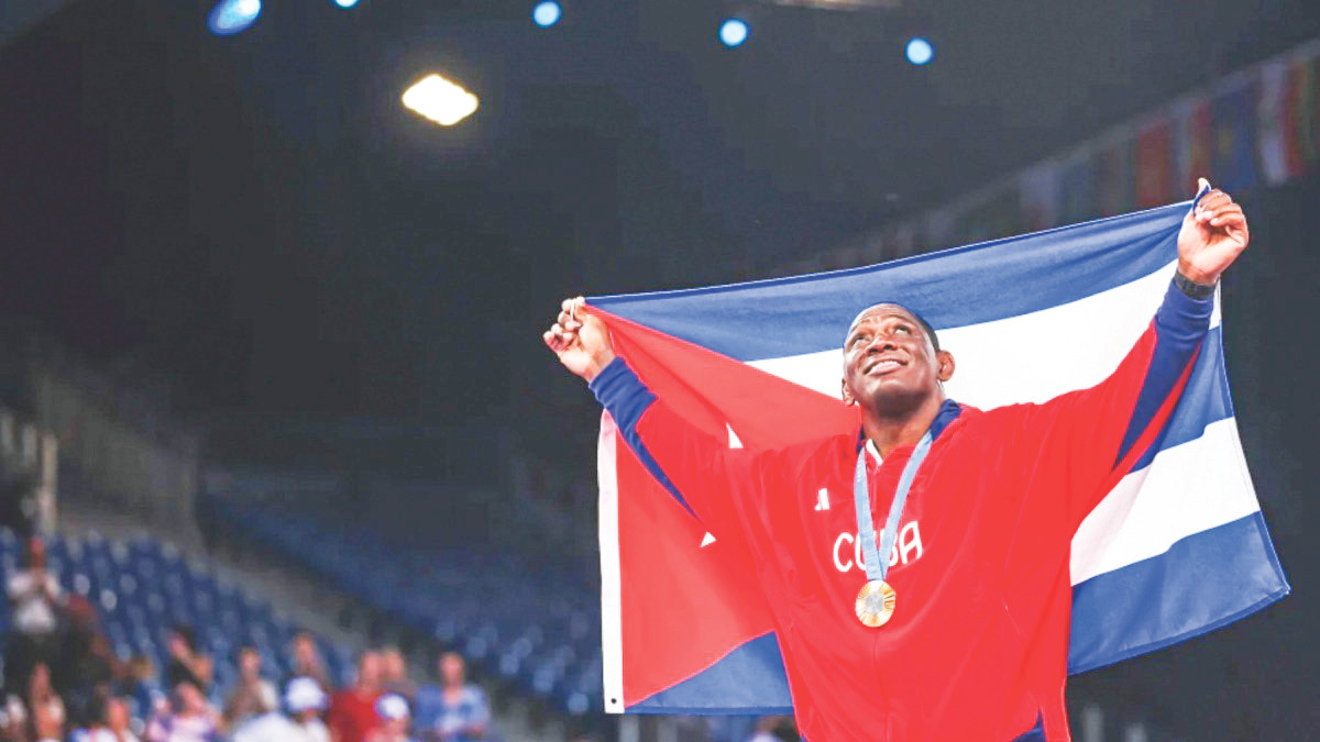 Đô vật Mijain Lopez của Cuba trở thành VĐV đầu tiên trong lịch sử giành 5 Huy chương Vàng liên tiếp. Ảnh: Getty Images