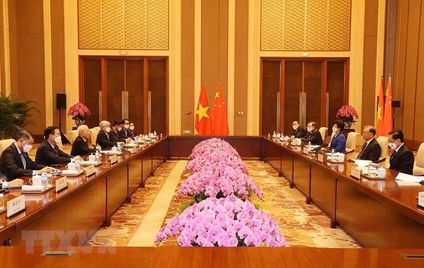 Quang cảnh buổi hội kiến giữa Tổng Bí thư Nguyễn Phú Trọng và Chủ tịch Chính hiệp Trung Quốc Uông Dương. (Ảnh: Trí Dũng/TTXVN)