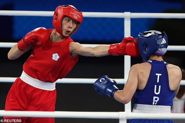 Võ sĩ Lin Yu-Ting (áo đỏ, Đài Loan, Trung Quốc) cũng gây tranh cãi về giới tính khi thi đấu boxing nữ hạng cân 57 kg tại Olympics Paris. Ảnh: Reuters. Võ sĩ Lin Yu-Ting (áo đỏ, Đài Loan, Trung Quốc) cũng gây tranh cãi về giới tính khi thi đấu boxing nữ hạng cân 57 kg tại Olympics Paris. Ảnh: Reuters.