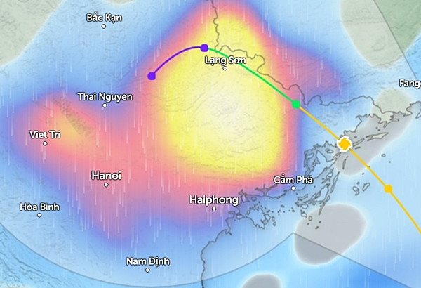 Dự báo mưa diện rộng ở miền Bắc vào sáng mai, 23/7, khi bão số 2 đổ bộ (những vùng màu xanh da trời là mưa nhỏ đến vừa, màu đỏ là mưa vừa đến mưa to, màu vàng đến trắng là mưa rất to). Ảnh: Zoom Earth, OpenStreetMap.