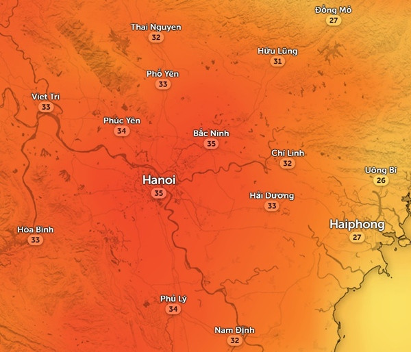 Nhiệt độ thực ngoài trời ở Hà Nội và một số tỉnh thành miền Bắc vào chiều nay, 21/2: Gió Đông Nam và độ ẩm cao khiến trời khá nóng bức. Ảnh: Zoom Earth, OpenStreetMap.